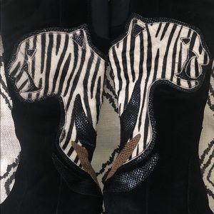 Tall black suede boots with animal appliqué